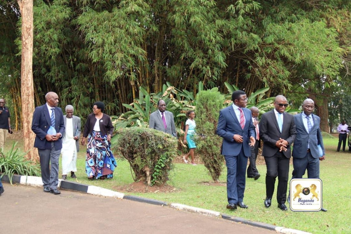 The Katikkiro interacting with Kisekwa after the ceremony Image